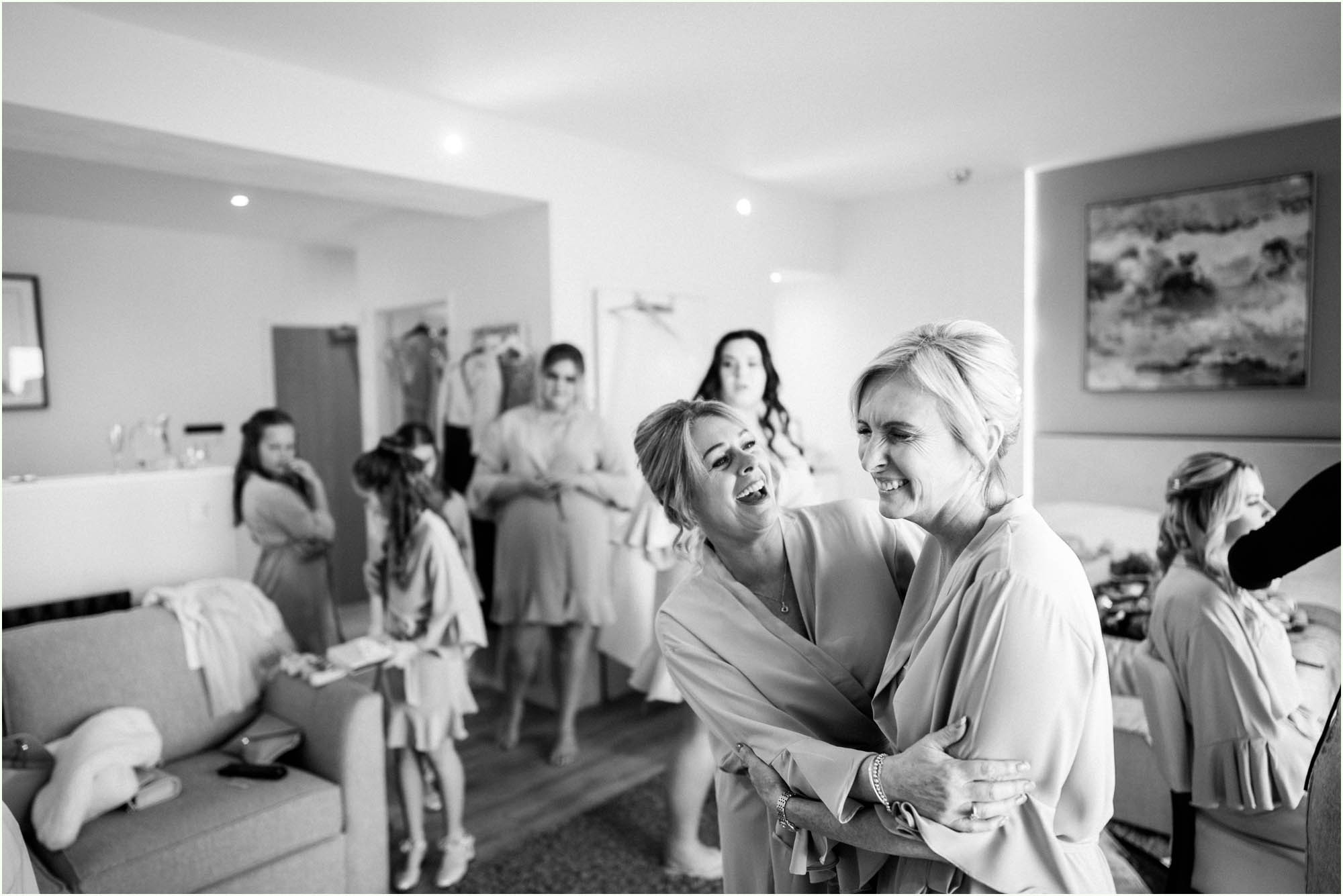 Adam and Abbie's Sandy Cove wedding in Devon with an outdoor ceremony and elegant summer styling in ivory and blush