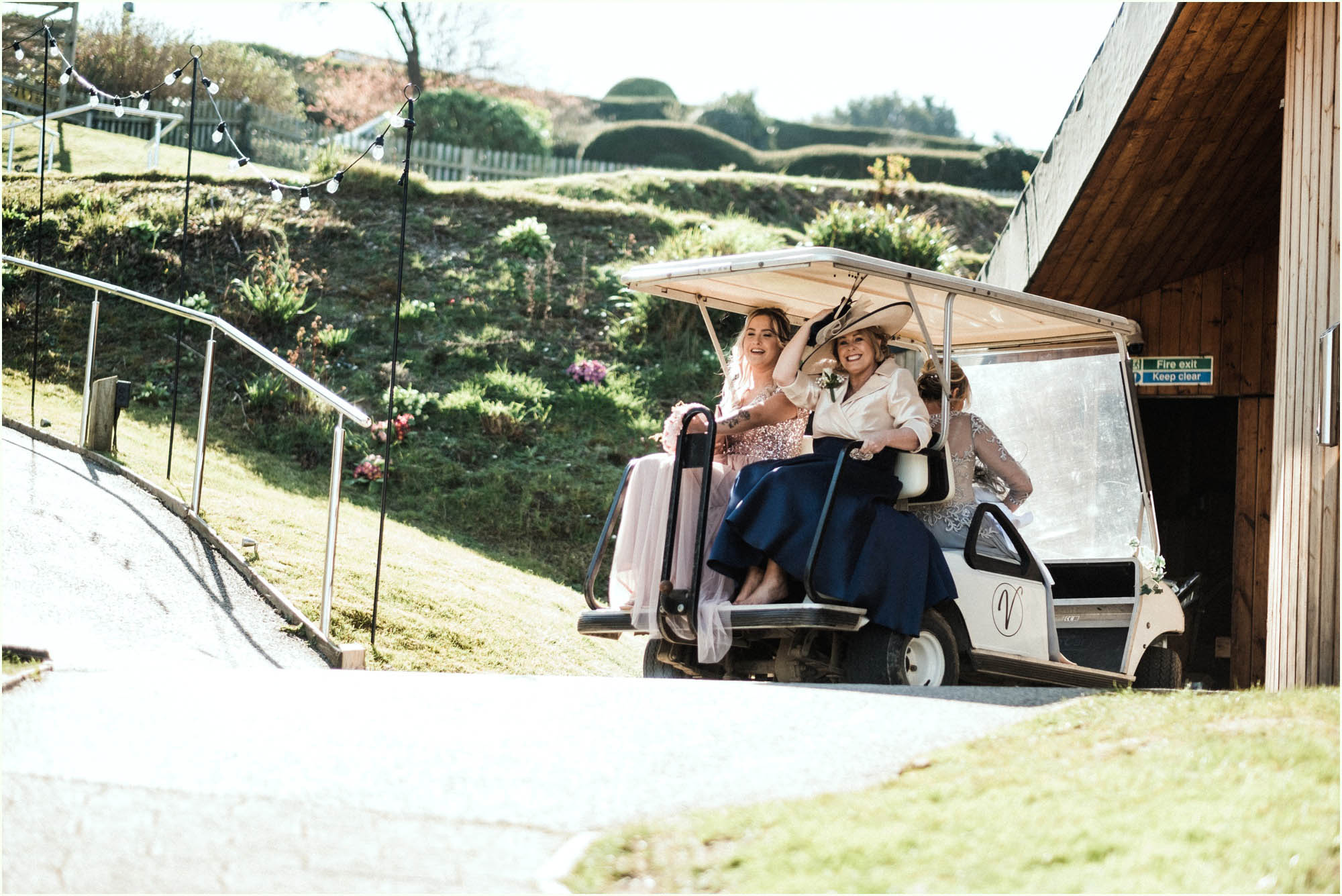 Adam and Abbie's Sandy Cove wedding in Devon with an outdoor ceremony and elegant summer styling in ivory and blush