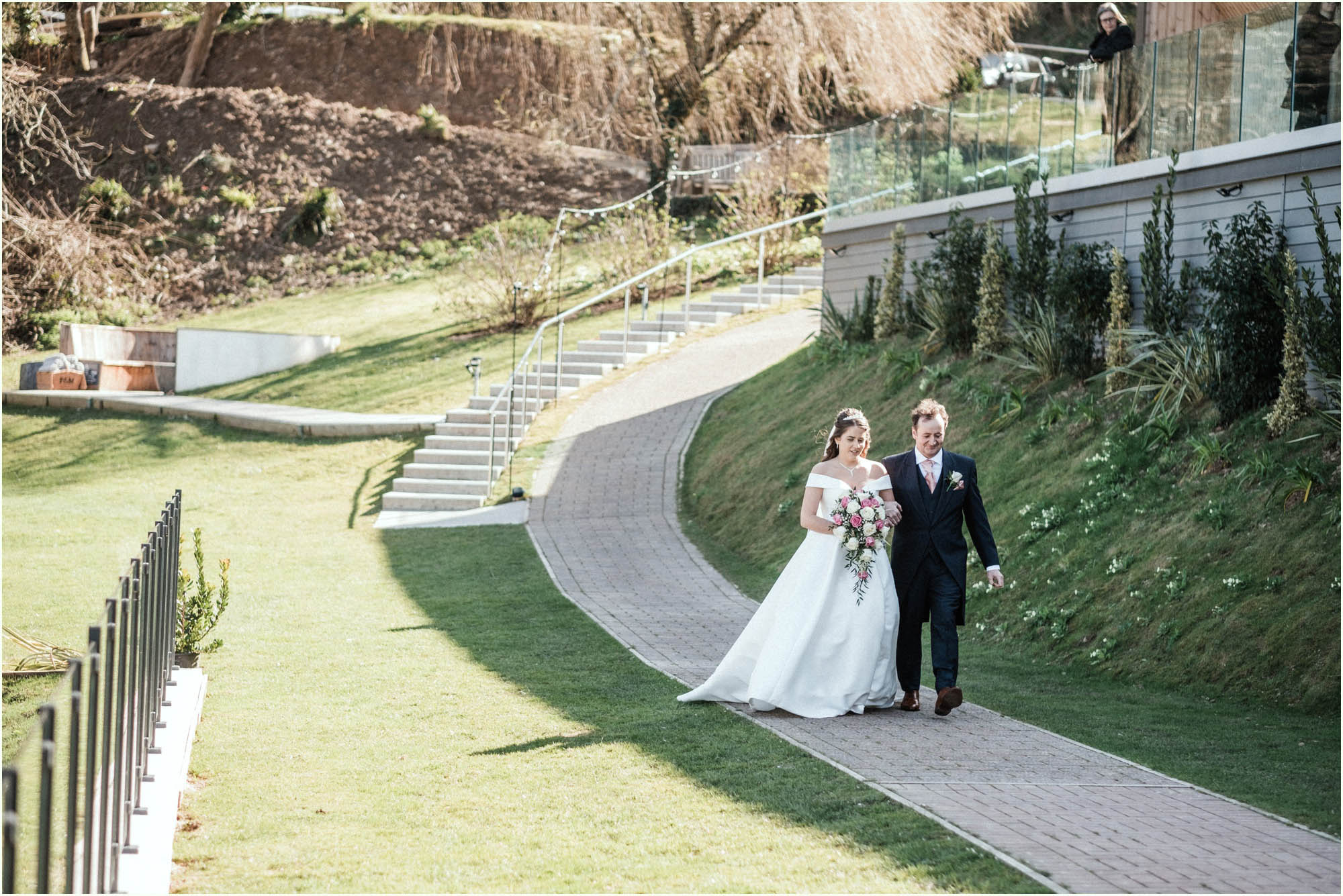 Adam and Abbie's Sandy Cove wedding in Devon with an outdoor ceremony and elegant summer styling in ivory and blush